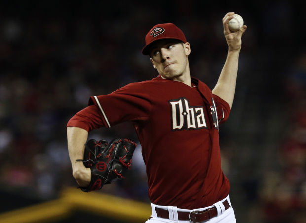 Diamondbacks 4, Rockies 2: Corbin hurls D-backs into first